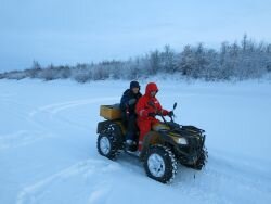 Ina and Min are driving a quad. 